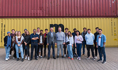 The Group of MIM Students, Prof. Dr. Arnaout and Mr. Ivanov in front of Container-Landscapes